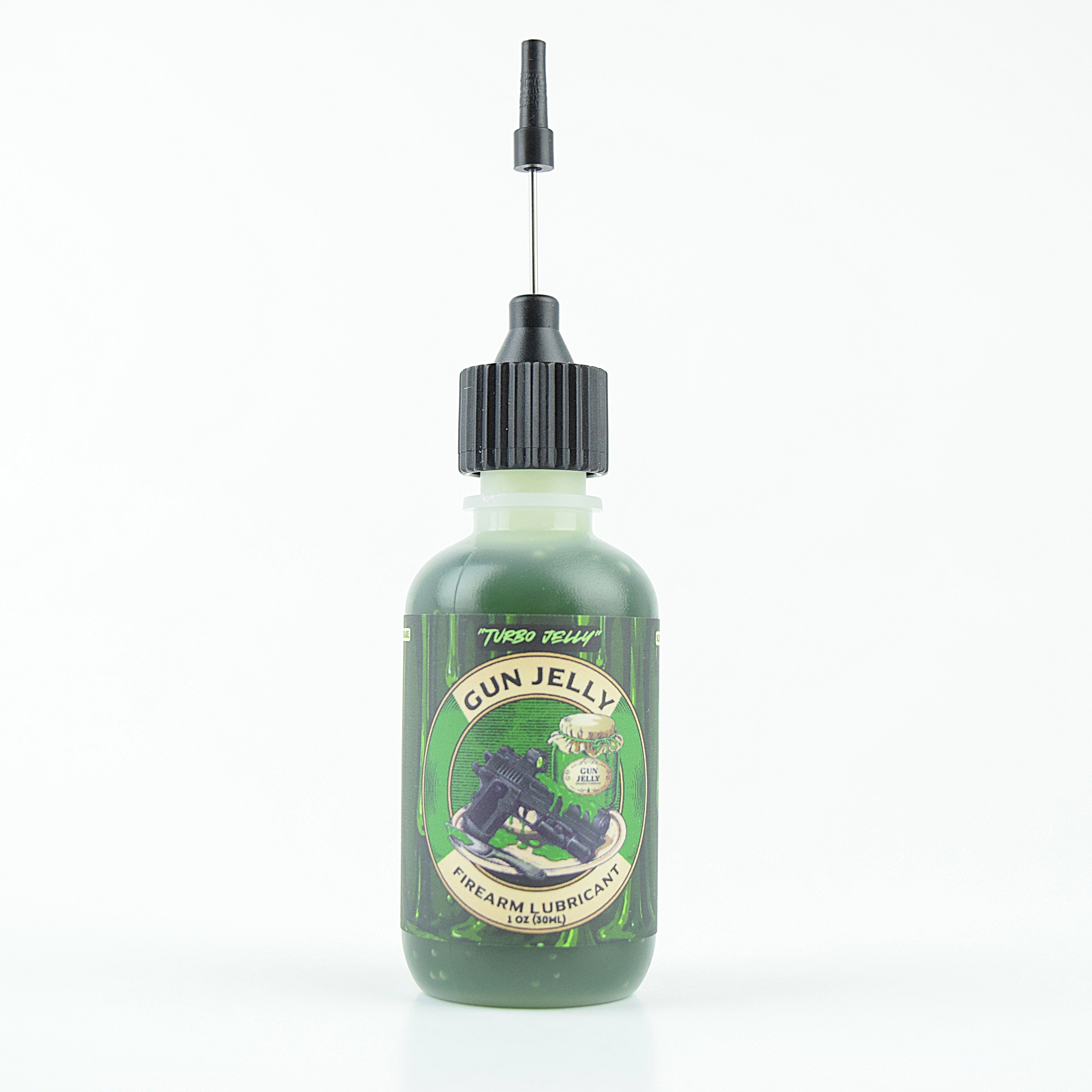 Green bottle of Turbo Jelly by Gun Jelly Firearm Lubricant 1oz bottle with needle tip applicator and sheath.